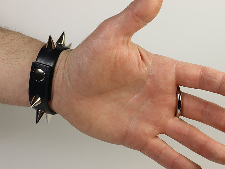 Spiked Bracelet with Finger Strap and Metal O-ring