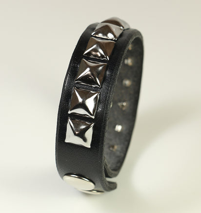pyramid studded bracelet with double snaps