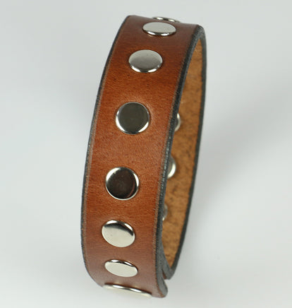 Brown leather bracelet with rivets