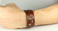 wrist view of brown bracelet