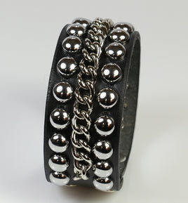 black leather bracelet with dome spots and brass chain