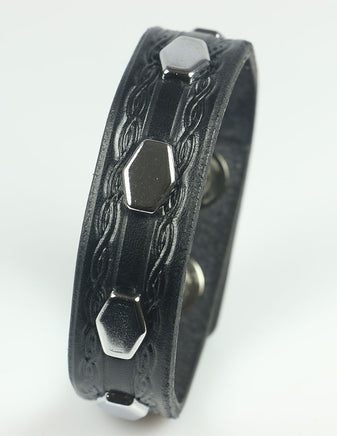 Hexagon studded bracelet with embossing, black leather