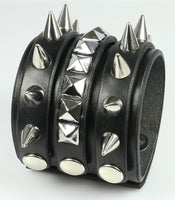 Spiked Leather Wristband / pyramids and half inch cone spikes