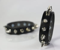 Pair of tree spiked leather bracelets