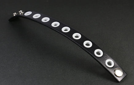 snaps, eyelets, and black leather make a great bracelet